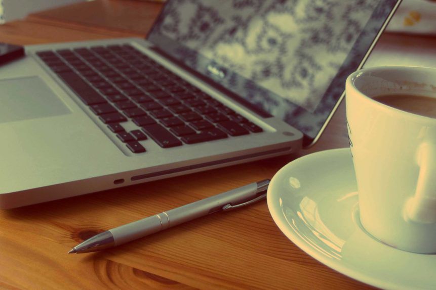 laptop side view with coffee